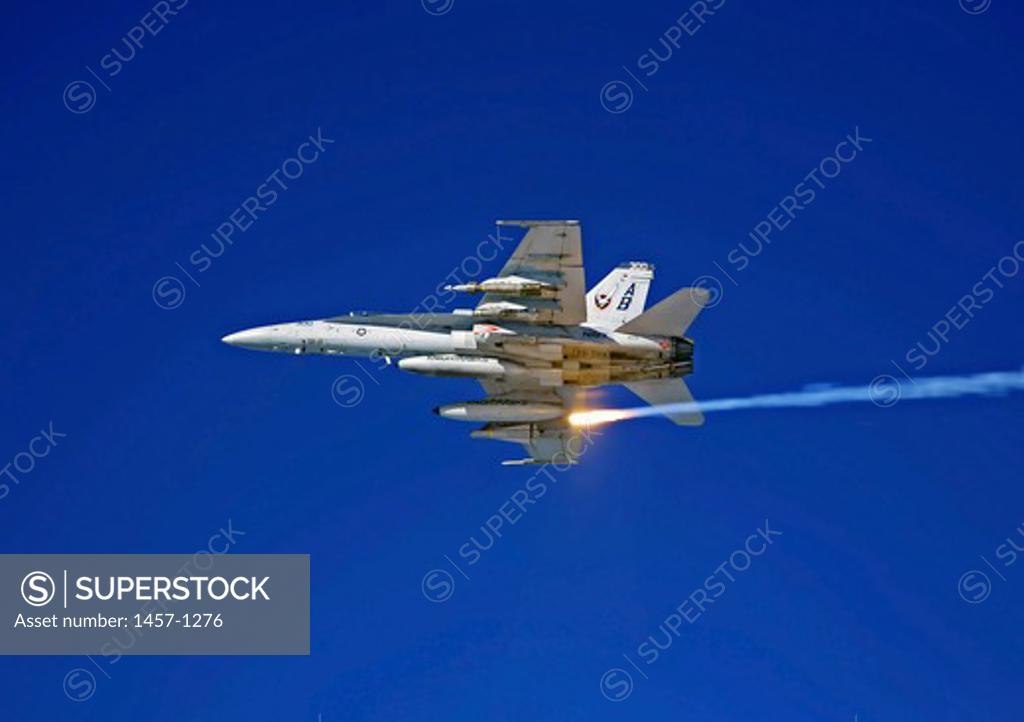 An FA 18C Hornet Tests Its Flare Countermeasures System Prior To