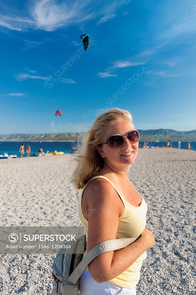 Tourist On Zlatni Rat Beach In Bol On Brac Island Croatia Superstock