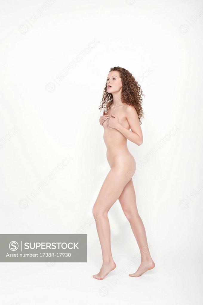 Naked Woman Covering Her Breasts SuperStock