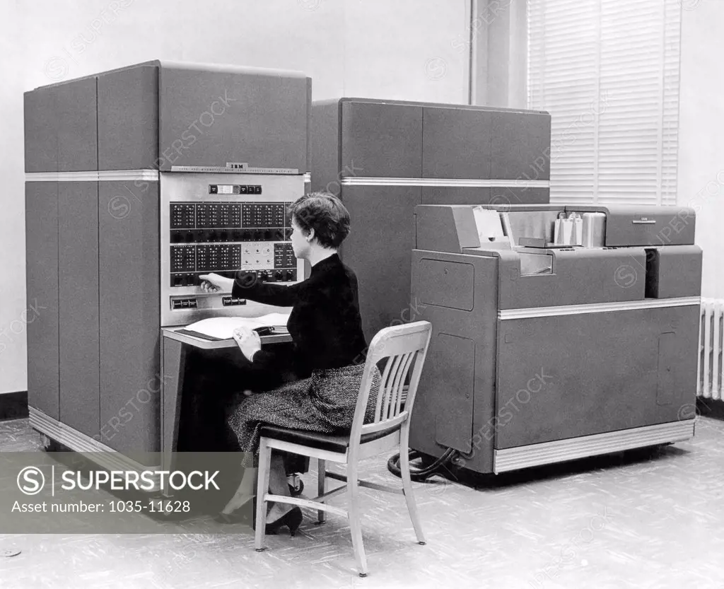 New York:  1954. IBM 650 Data Processing System, the first mass produced computer. IBM sold 450 of them the first year. Acessories include up to 4 disk units, each holding 6 Mb of data..