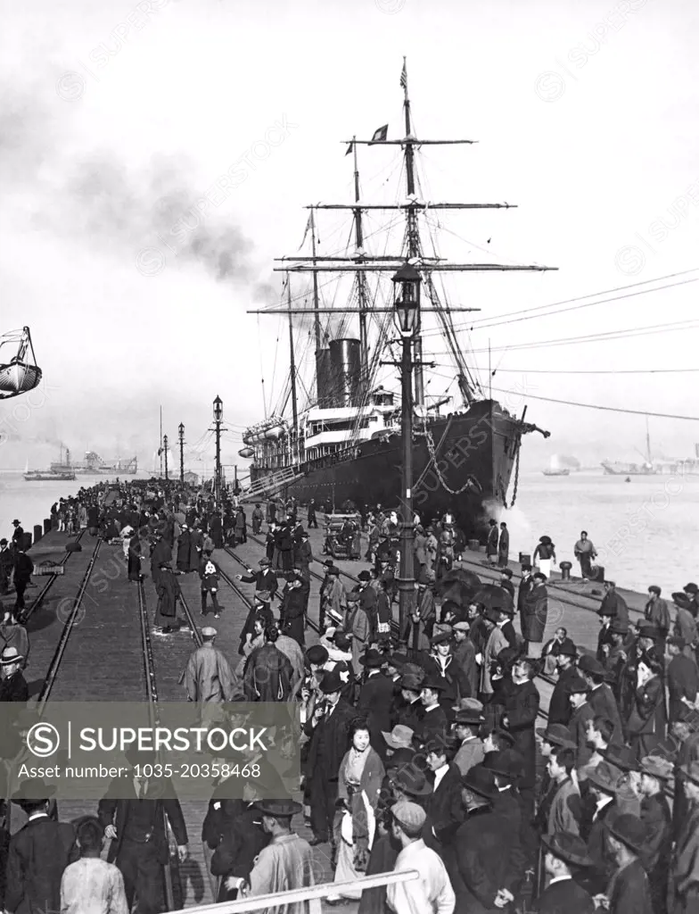 Yokohama, Japan:  c. 1910 People on the docks where the Pacific Mail steamer, the SS China has arrived.