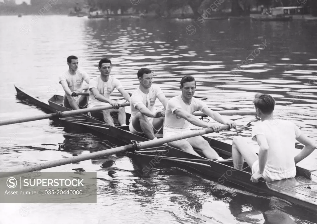 London, England:  September 13, 1942 Members of the U.S. Army Air Force boat crew row out for the start of a race against the London Metropolitan Police Club over a half mile on the Thames.