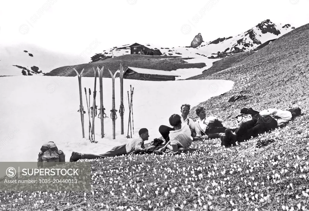 Arosa, Switzerland:   c.  1930 Skiing in the springtime in the Grisons in Switzerland has the side benefit of relaxing in the crocuses.