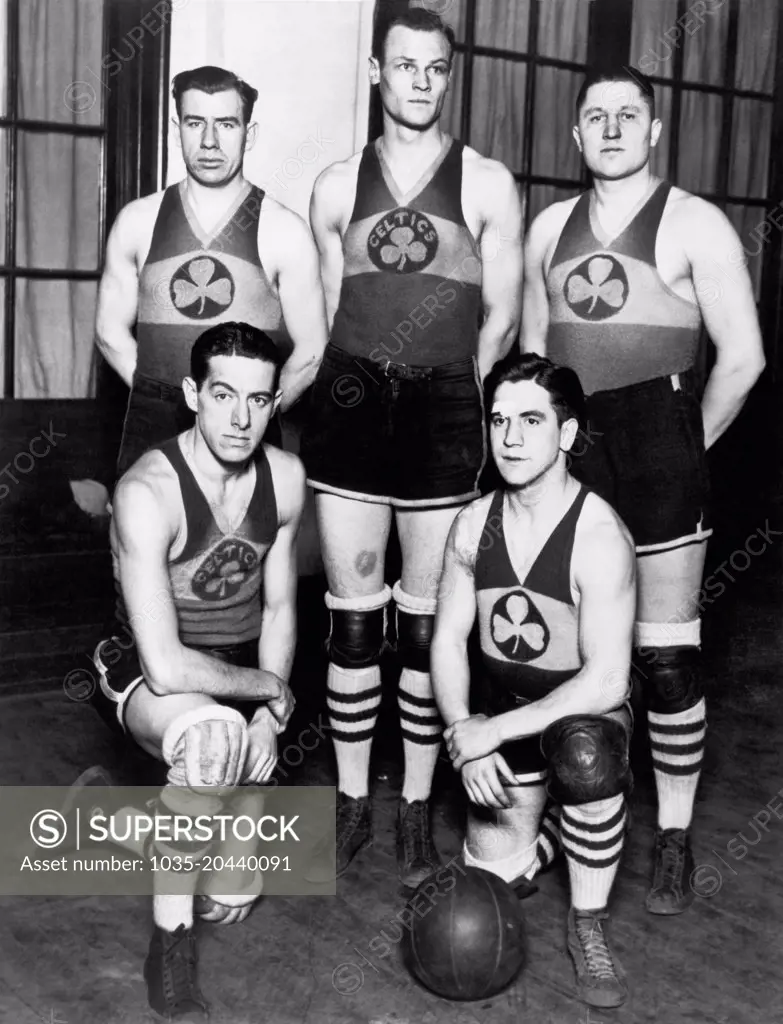 New York, New York:   c. 1924 The "Original Celtics" basketball team, with back row:  Joe Lapchick, (center) Dutch Dennart, right), Front row: Nat Holman (left), Davey Banks (right).