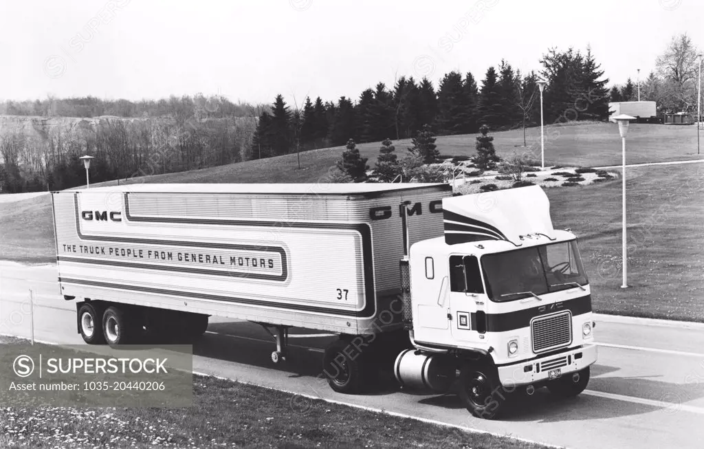 Pontiac, Michigan:  1975 A GMC Astro 95 highway tractor with the new Dragfoiler mounted on the cab roof to reduce air drag and improve fuel economy.