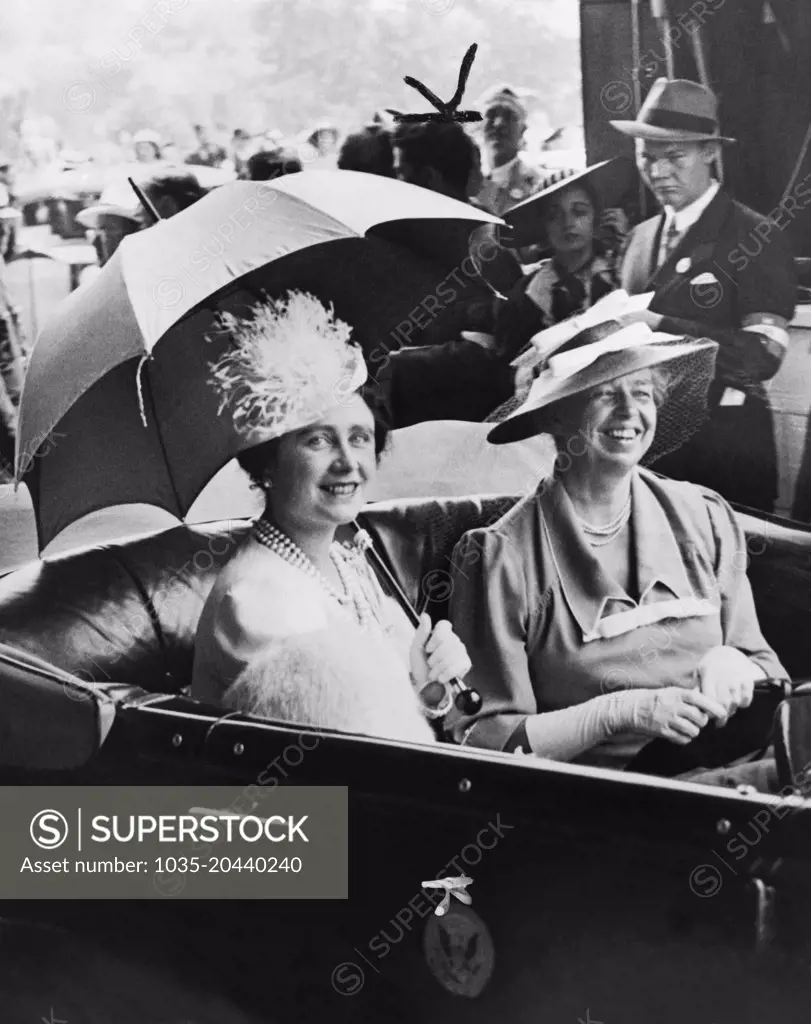 Washington, D.C.:  1939 Mrs. Eleanor Roosevelt, right and Queen Elizabeth, in an automobile leaving the train station for the White House.