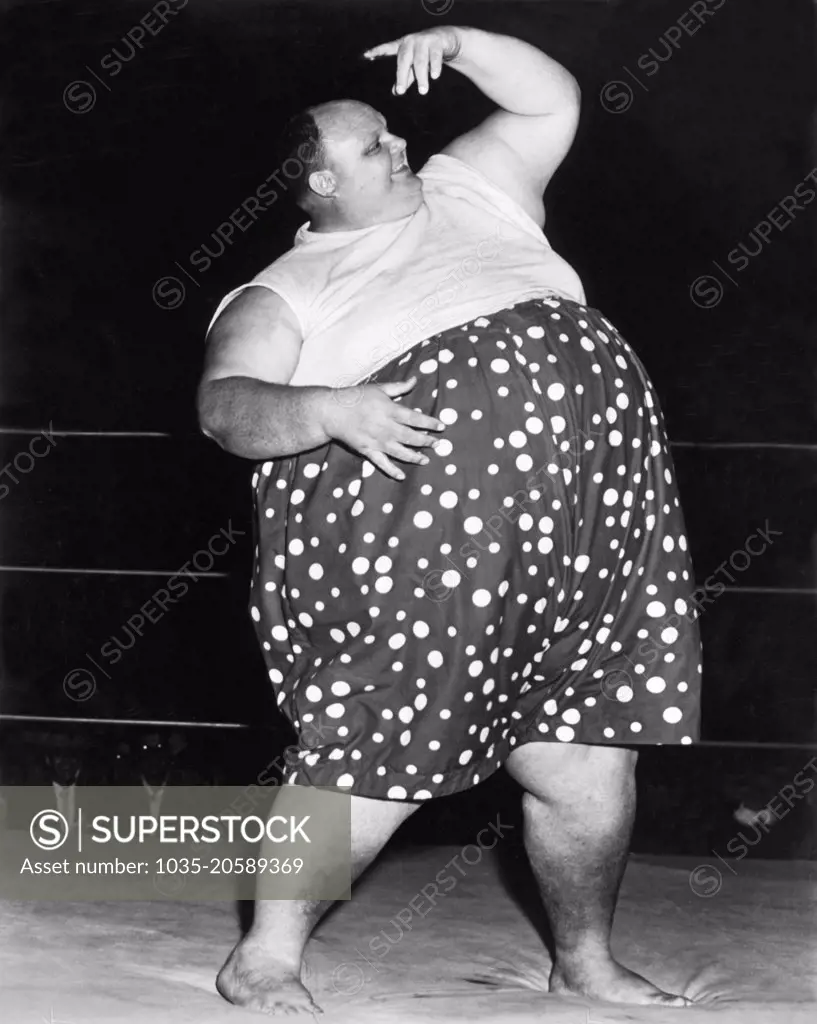 United States:  c. 1956 A portrait of professional wrestler William Cobb, better known as Happy Humphrey. He was the heaviest professional wrestler of all time, averaging 750 pounds during his career with one occasion of weighing in at over 900 pounds.