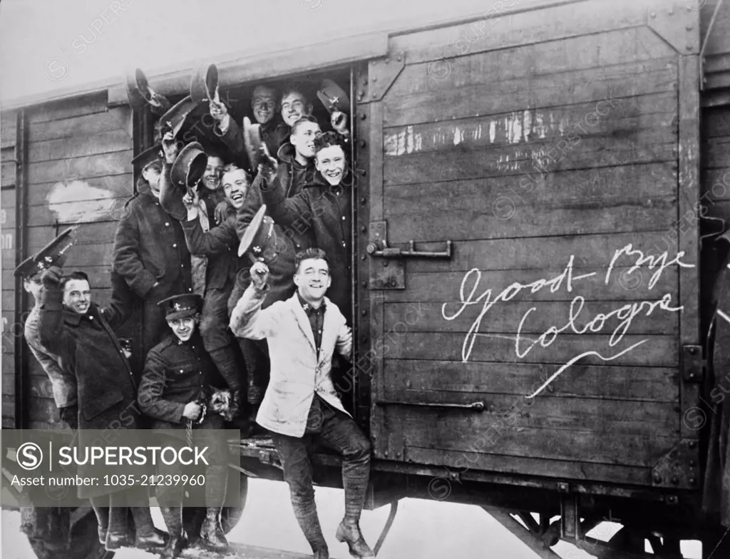 Cologne, Germany:  December 14, 1925 Members of the British Army of Occupation rejoice at leaving Cologne in a boxcar after the signing of the Locarno Pact in Switzerland.