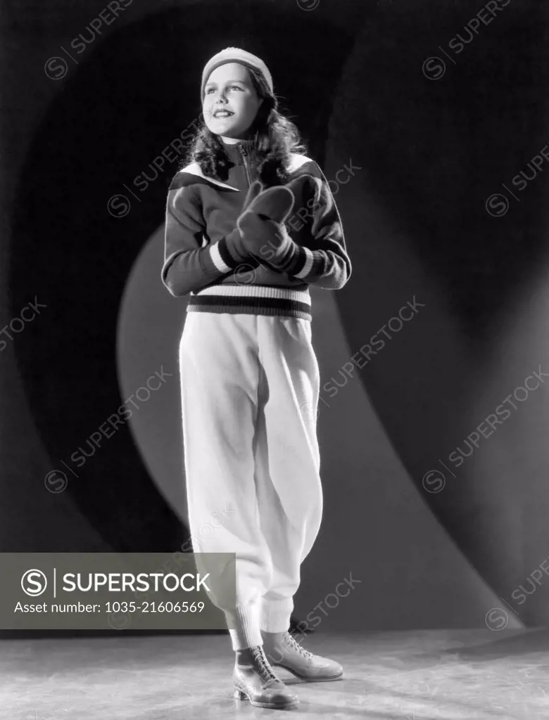 Hollywood, California:  1935 Actress Helen Parrish models a fashionable winter outfit. She is currently starring in "A Dog of Flanders".