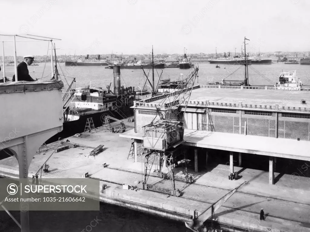 Alexandria, Egypt:  c. 1930 A view of the harbor and piers.