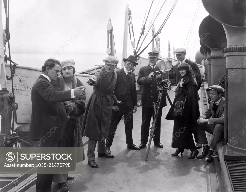 Los Angeles, California:  1917 The filming of the silent Paralta Plays production, " A Man's Man".  Johnny Meighan is the assistant director, and is possibly seated in doorway.