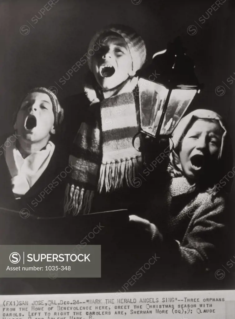 Portrait of three children singing, 1942