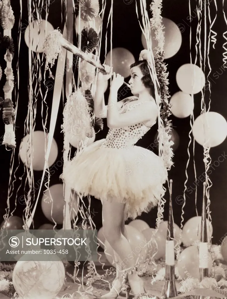 Side profile of a young woman at a party