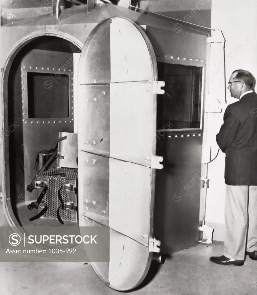 Mature man standing near a gas chamber, State Prison, Jefferson City, Missouri, USA, 1953