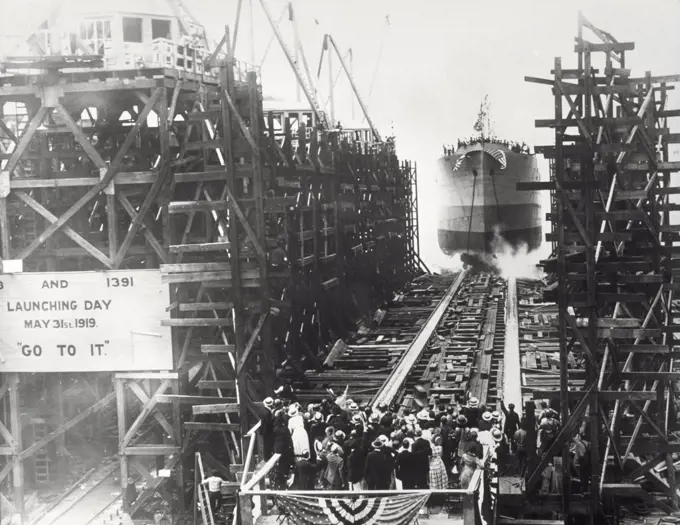 Group of people celebrating the launching of a cruise ship, 1919