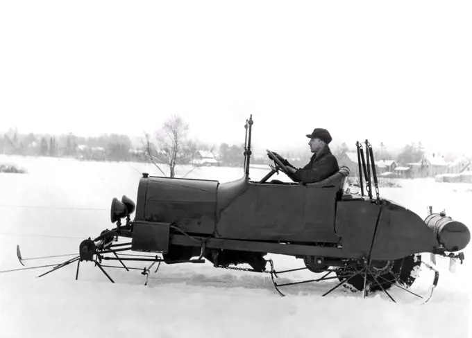 United States:  January 13, 1927. An intrepid inventor tries out his version of an early snowmobile.