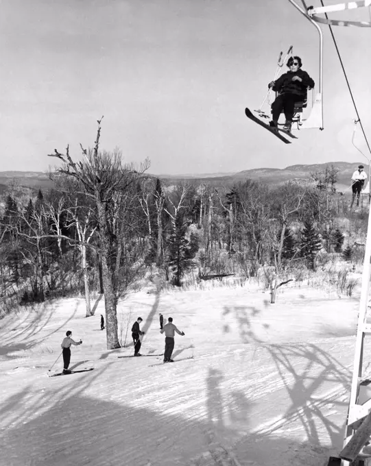 Canada:  c. 1953. This photo shows the single ski lift at a Canadian Ski Resort.