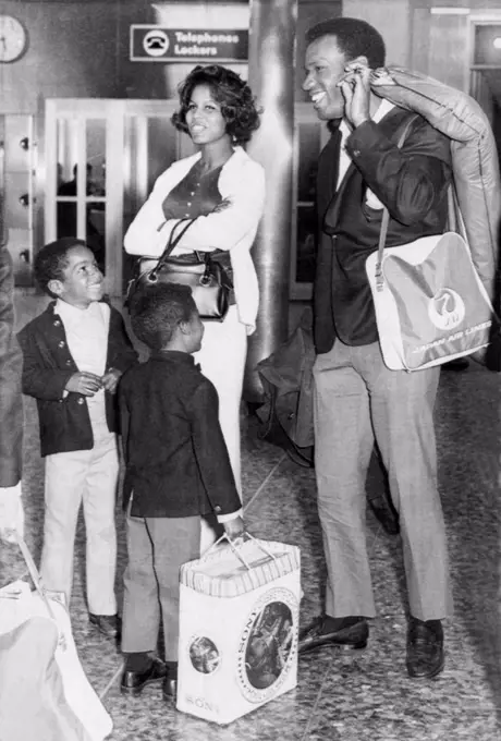 San Francisco, California:  March 31, 1970 Bobby Bonds of the San Francisco Giants returns from an exhibition baseball tour of Japan and is greeted at the SF airport by his wife, Pat, and his two sons, Barry (l) and Ricky (r).