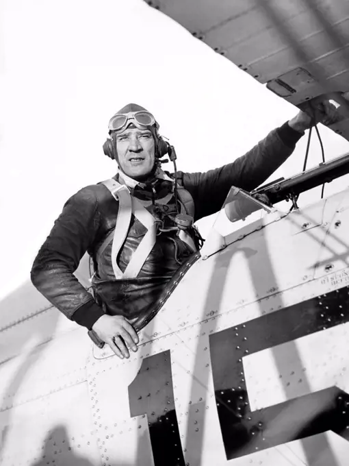 Miami, Florida:  January 15, 1934 Noted airman Frank Hawks in the cockpit of his plane at the Miami Air Meet.