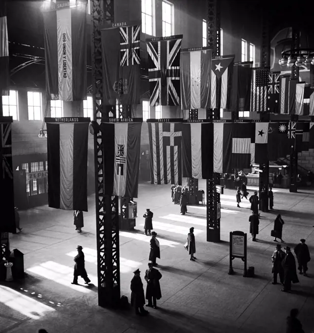 Chicago, Illinois:    January, 1943 The Union Station concourse with the flags of various countries hanging from the ceiling.