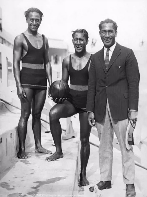 Paris, France:  July 16, 1924 Hawaii's trio of great swimmers, Sam, Dave and Duke Kahanamoku at the Paris tank for the Olympic elimination swimming trials.