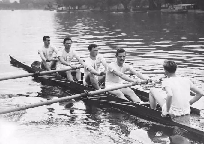 London, England:  September 13, 1942 Members of the U.S. Army Air Force boat crew row out for the start of a race against the London Metropolitan Police Club over a half mile on the Thames.