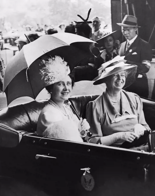 Washington, D.C.:  1939 Mrs. Eleanor Roosevelt, right and Queen Elizabeth, in an automobile leaving the train station for the White House.