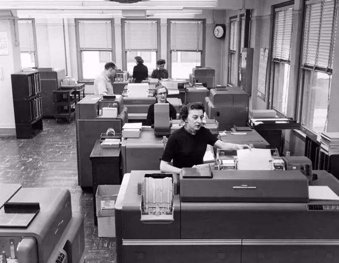 Cleveland, Ohio:  January 22, 1958 Women office workers entering data using IBM tabulating machines and punch cards at the Erie Railroad Company offices.