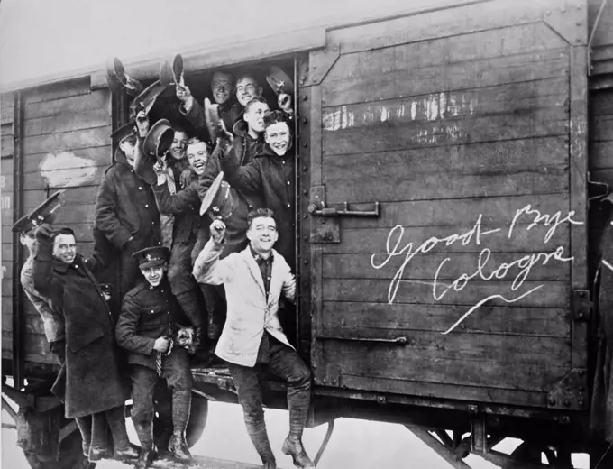 Cologne, Germany:  December 14, 1925 Members of the British Army of Occupation rejoice at leaving Cologne in a boxcar after the signing of the Locarno Pact in Switzerland.