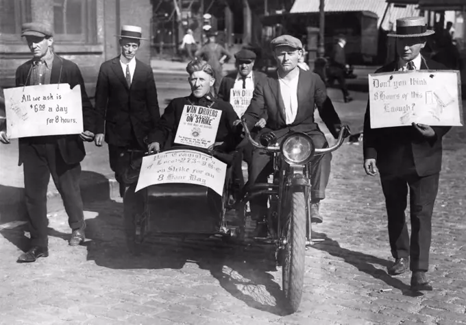 New York, New York:  September 15, 1920 Striking moving van teamsters picket a Harlem warehouse at 100th Street and Third Avenue. They want $6 for an 8 hour day.