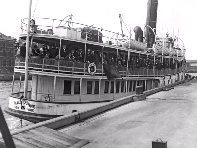 New York, New York:  August 21, 1923 Immigrants arriving at Ellis Island aboard the tender Machigonne.