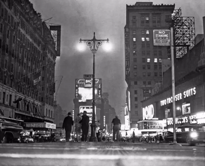 New York, New York:  June 13, 1961. New York City's "Great White Way" is only half lighted in this view of Broadway during a massive power outage in midtown Manhattan.  The east side is ablaze in lights while the west side of Broadway is blacked out. This view is looking north from Times Square.