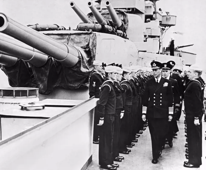 England: June, 1944 King George VI of Great Britain moves down the line on an inspection tour of one of HMS Royal Navy warships. Little did the sailors know that the King was giving them a final inspection before D-Day.