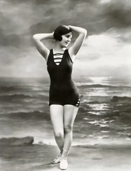 Young woman posing on the beach