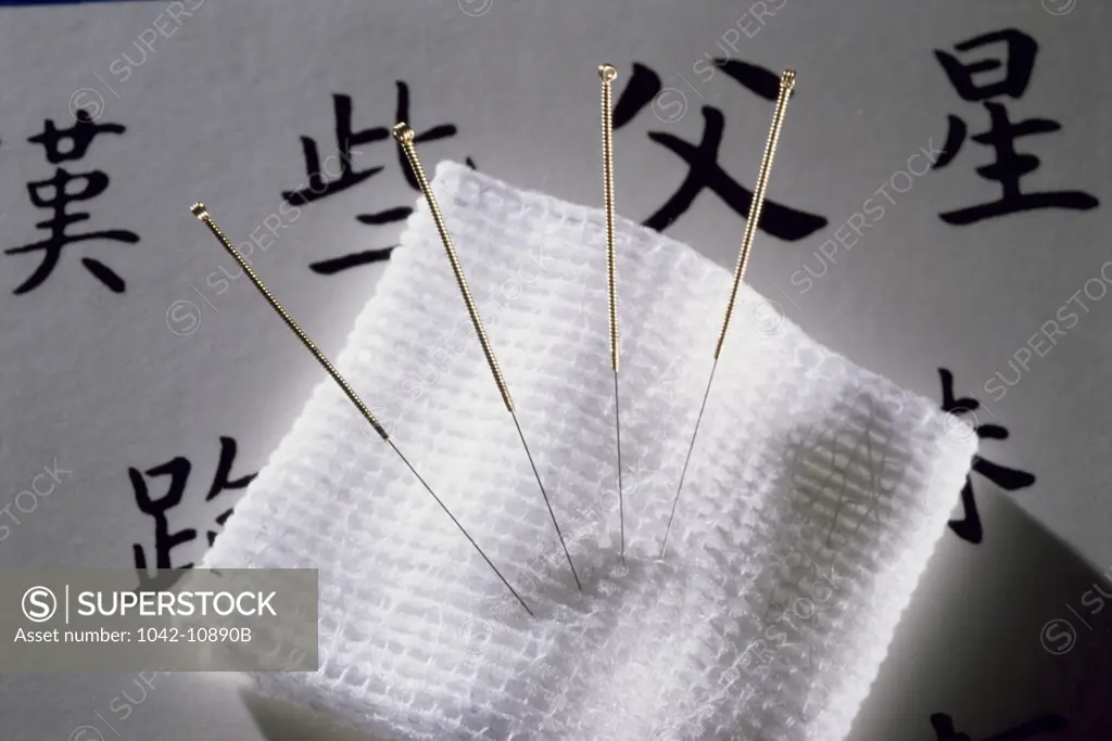 High angle view of acupuncture needles