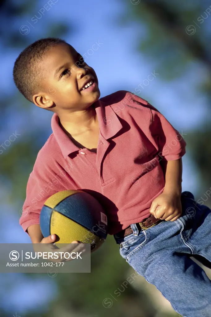 Boy holding a football