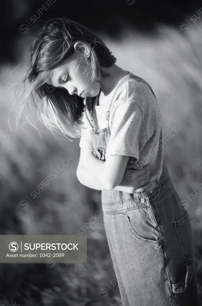 Side profile of a girl looking down