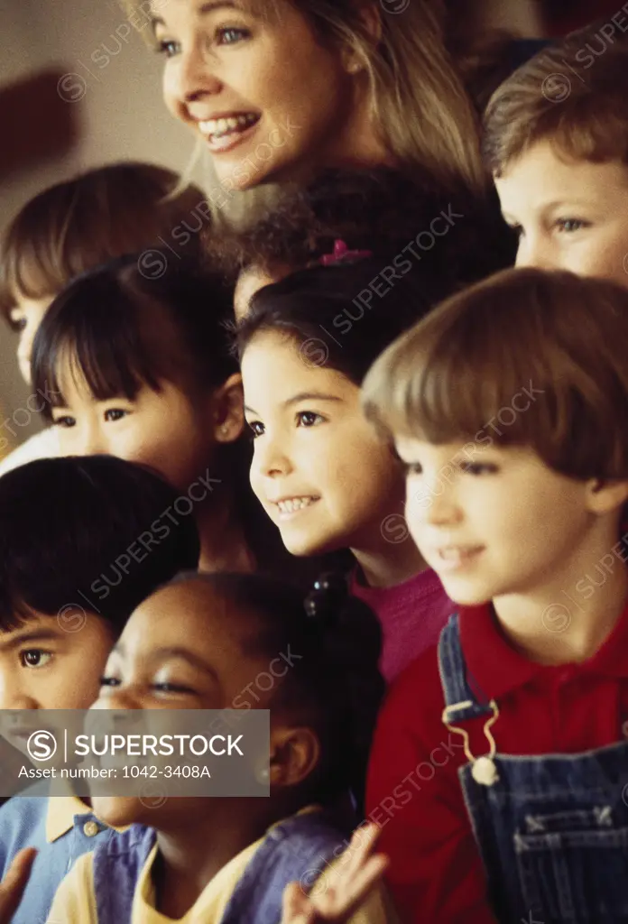 Teacher smiling with her students