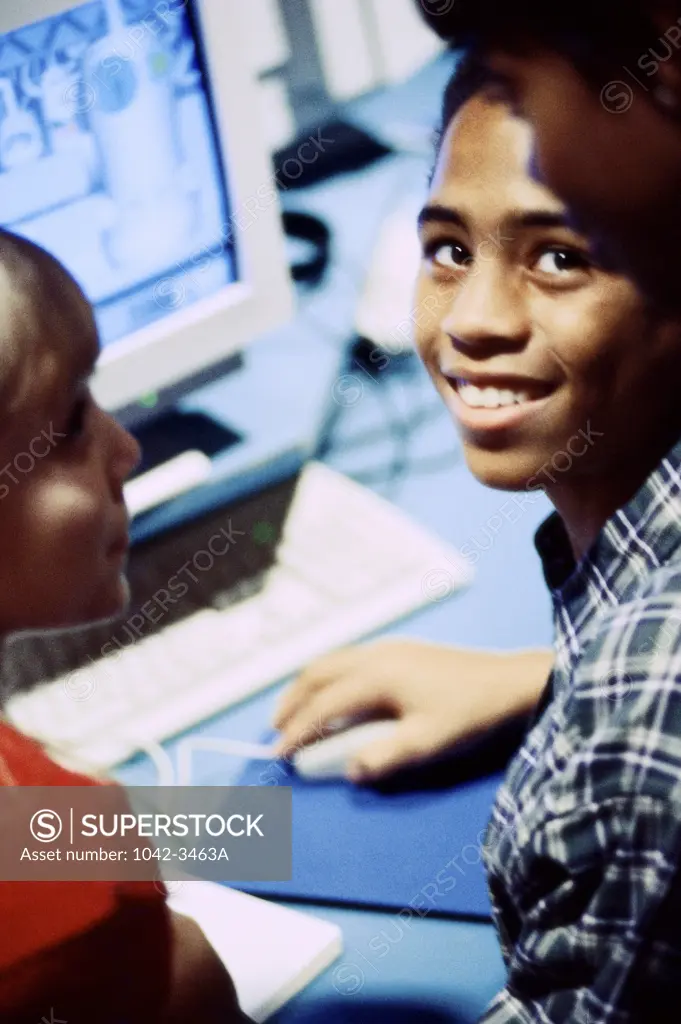 Teenagers in a computer class