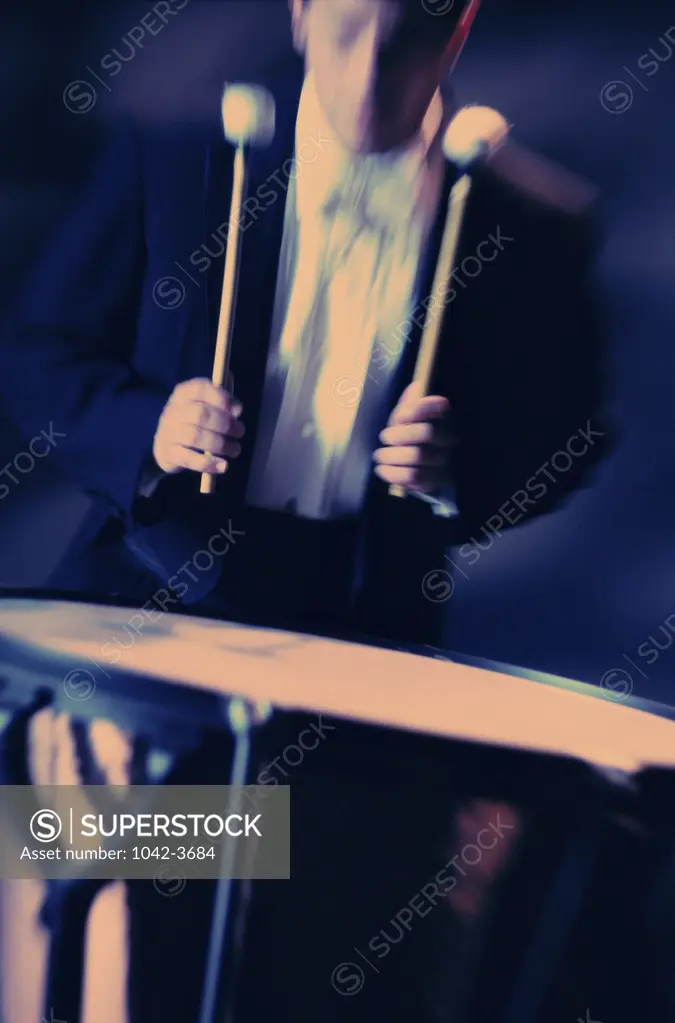 Young man playing the drums