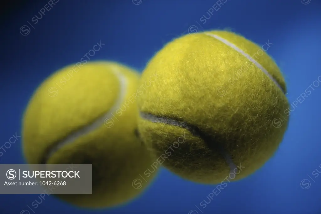 Close-up of two tennis balls