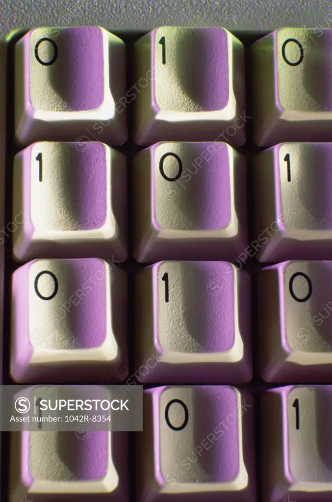 Close-up of computer keys with the binary code