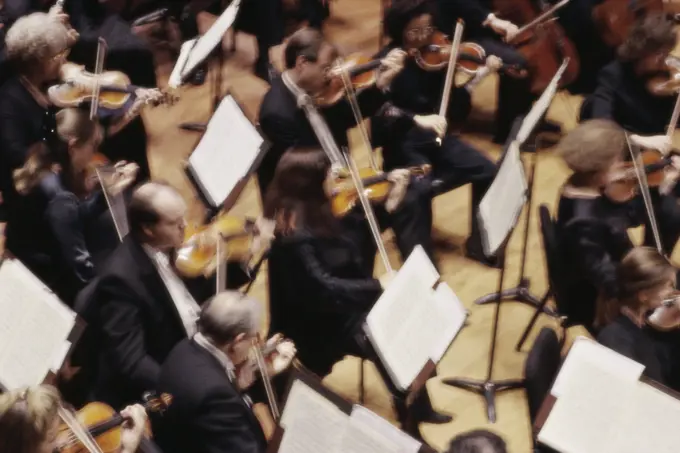 High angle view of an orchestra playing in a concert hall