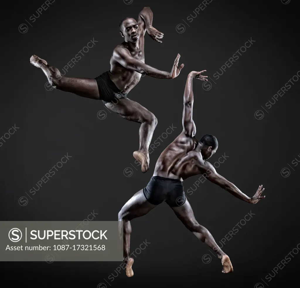 Lloyd Boyd dancing against a dark background. Bodies in Action.