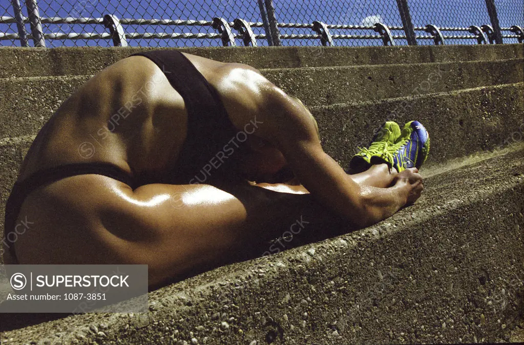 Woman exercising in a field