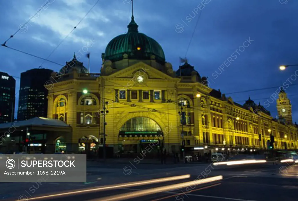 Facade of a railroad station lit up at night, Flinders Street Station, Melbourne, Victoria, Australia