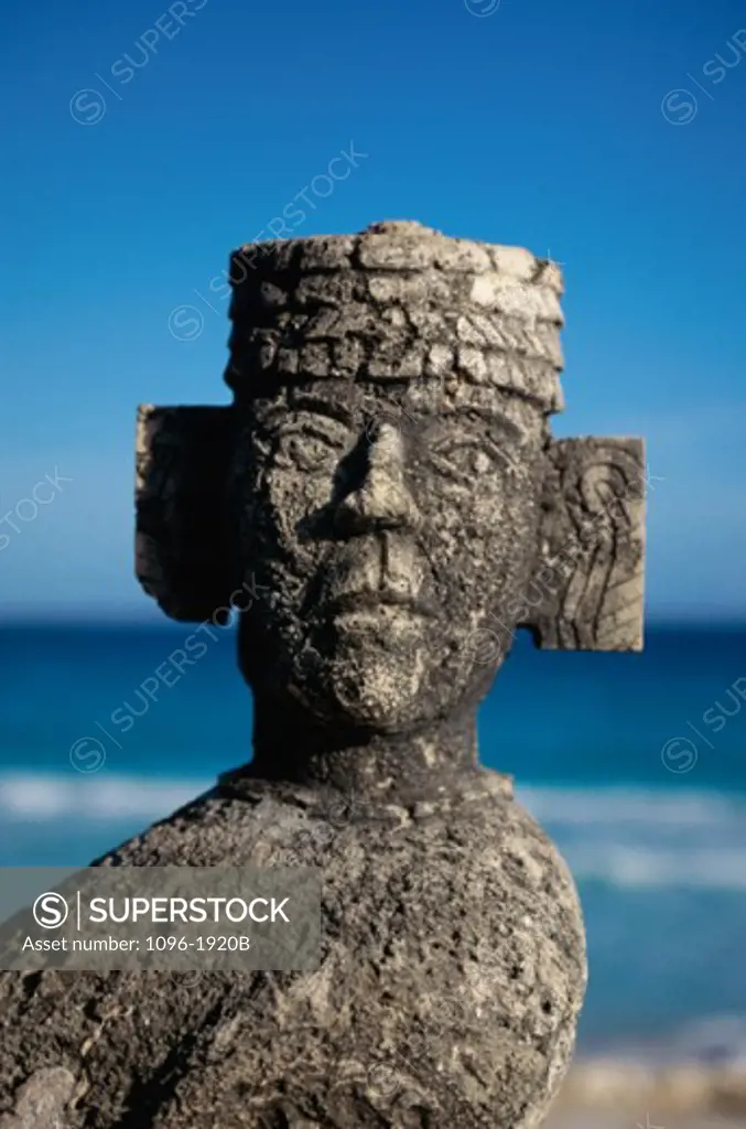 Close-up of Chac Mool statue on the beach, Cancun, Mexico