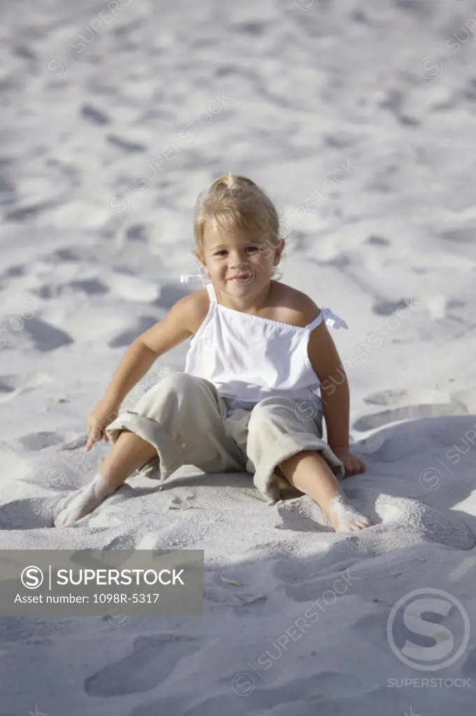 Portrait of a girl sitting on the beach