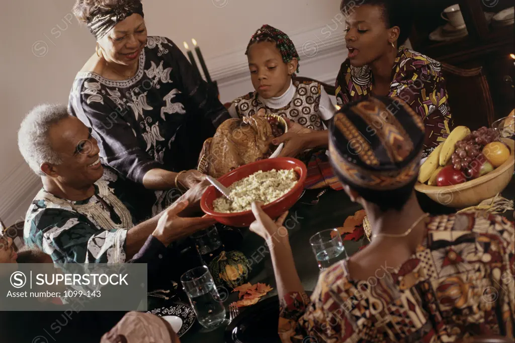 High angle view of a family having dinner