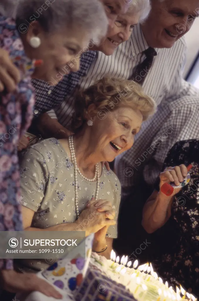 Group of senior people celebrating at a birthday party